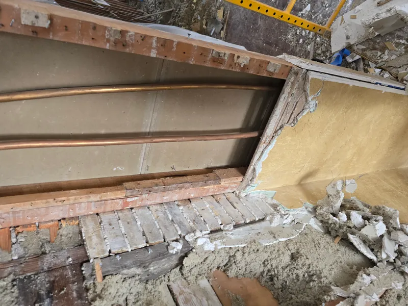 Heavy construction debris hauled from interior demolition site