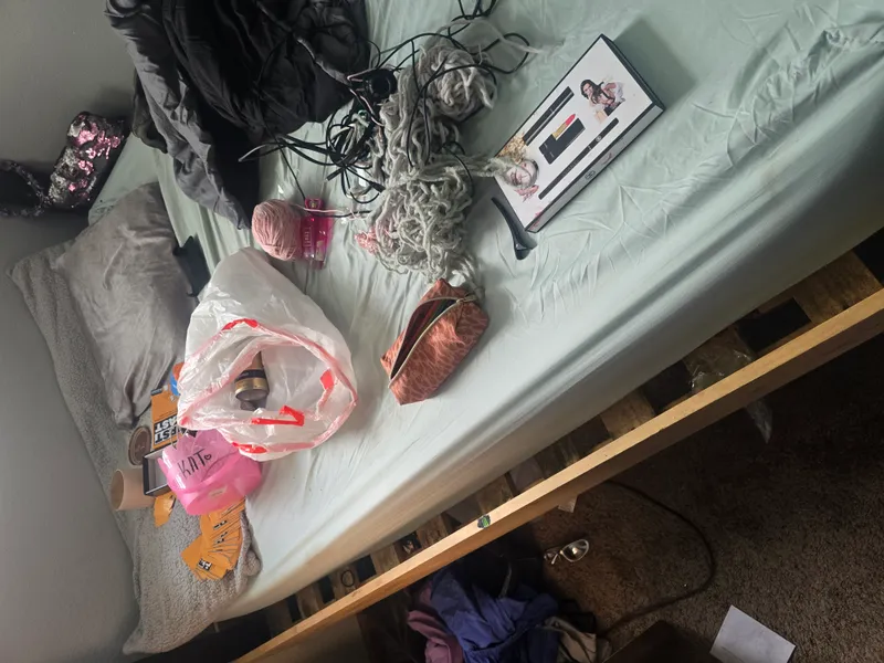 Bedroom cleanout — cluttered room before junk removal