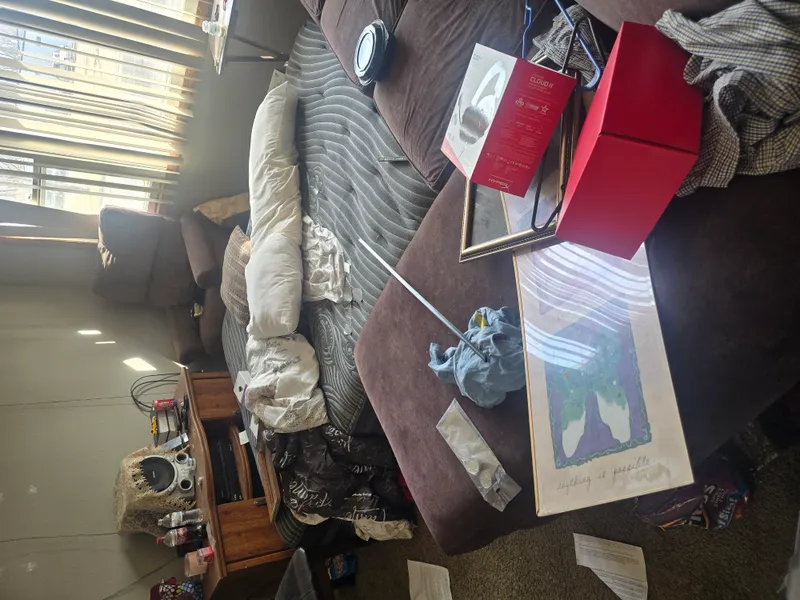 Residential junk removal — cluttered room before hauling