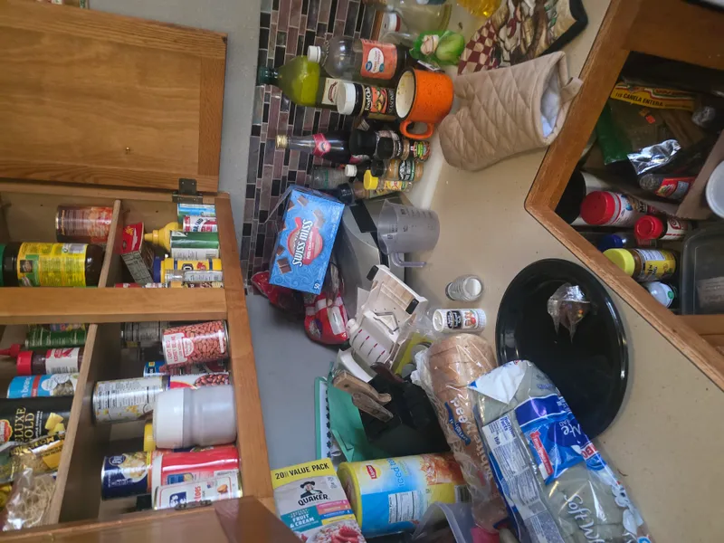 Residential junk removal job — clearing packed storage areas